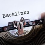 Backlinking - Gray Typewriter with White Paper