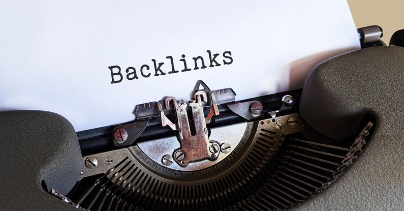 Backlinking - Gray Typewriter with White Paper