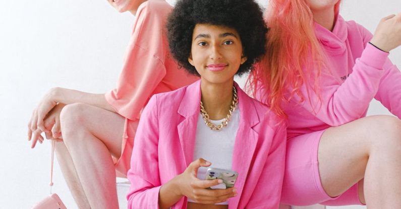 Long-Form Content - Happy multiracial teenagers in trendy clothes with gadgets