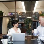 Agency - Man and Woman Having a Meeting in the Office