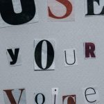 Campaigns - Use Your Voice inscription on gray background