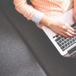 Blog - Person Sitting on Gray Sofa While Using Macbook