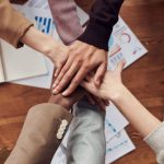 Partnerships - Photo Of People Near Wooden Table