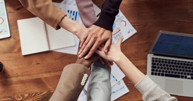 Partnerships - Photo Of People Near Wooden Table